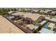Aerial view of backyard of home with well manicured lawn at 21284 E Camacho Rd, Queen Creek, AZ 85142