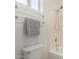 Clean bathroom featuring a modern toilet and convenient towel racks at 21284 E Camacho Rd, Queen Creek, AZ 85142