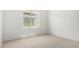 Bright bedroom with carpet and window at 21284 E Camacho Rd, Queen Creek, AZ 85142