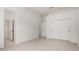 Large main bedroom with ceiling fan, sliding closet, and ensuite bathroom at 21284 E Camacho Rd, Queen Creek, AZ 85142