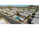 Aerial view of community pool, homes, and mountain views at 2233 E Behrend Dr # 162, Phoenix, AZ 85024
