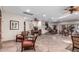 Spacious recreation room with tiled floors, seating and several tables at 2233 E Behrend Dr # 162, Phoenix, AZ 85024