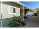 Charming home featuring a covered porch and low-maintenance gravel landscaping at 2233 E Behrend Dr # 162, Phoenix, AZ 85024