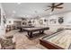 Game room with pool tables, shuffleboard table, and comfortable seating at 2233 E Behrend Dr # 162, Phoenix, AZ 85024