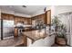 Kitchen with granite countertops, stainless appliances, and open layout at 2233 E Behrend Dr # 162, Phoenix, AZ 85024