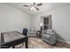 Cozy living area with wood-look flooring and comfortable seating at 2233 E Behrend Dr # 162, Phoenix, AZ 85024