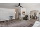 Spacious living room features neutral walls, plush carpeting, and an overhead fan at 2233 E Behrend Dr # 162, Phoenix, AZ 85024