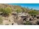 Aerial view of community pool featuring native desert landscaping and beautiful walking paths at 2233 E Behrend Dr # 162, Phoenix, AZ 85024