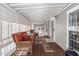 Covered porch featuring wood flooring and cushioned wicker furniture, great for relaxing at 2233 E Behrend Dr # 162, Phoenix, AZ 85024