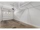 A large garage area with overhead storage racks at 2250 E Deer Valley Rd # 26, Phoenix, AZ 85024