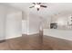 Open-concept living room with hardwood flooring and access to kitchen at 2250 E Deer Valley Rd # 26, Phoenix, AZ 85024