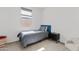 A bedroom featuring neutral tones and a comfortable bed at 22938 E Calle Luna --, Queen Creek, AZ 85142