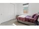 A bedroom featuring a cozy bed and a large closet at 22938 E Calle Luna --, Queen Creek, AZ 85142