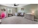 Spacious bedroom features a crib, changing table, and shelving for books and toys at 2466 E Harrison Ct, Gilbert, AZ 85295