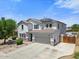 Beautiful two-story home with a well-kept lawn, solar panels, and an attached two-car garage in a desirable neighborhood at 2466 E Harrison Ct, Gilbert, AZ 85295