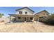 Spacious backyard with a covered patio at 24919 W Illini St, Buckeye, AZ 85326
