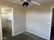 Bedroom with closet and ceiling fan at 24919 W Illini St, Buckeye, AZ 85326