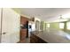 Open-concept kitchen with stainless steel appliances and access to other rooms at 24919 W Illini St, Buckeye, AZ 85326
