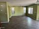 Open living room with tile floors, neutral paint, and plenty of natural light at 24919 W Illini St, Buckeye, AZ 85326
