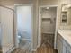 Bathroom showcasing dual sinks, tile floors, and a separate water closet and shower at 3390 S 180Th Ln, Goodyear, AZ 85338