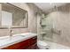 Updated bathroom with stone tile shower and quartz vanity at 3608 W Morelos St, Chandler, AZ 85226