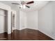 This bedroom has new hardwood floors and a ceiling fan at 3608 W Morelos St, Chandler, AZ 85226