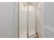 Bathroom featuring glass enclosed shower and louvred door at 3622 W Sunland Ave, Phoenix, AZ 85041
