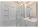 Newly updated bathroom featuring a glass shower enclosure and modern vanity at 3622 W Sunland Ave, Phoenix, AZ 85041