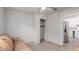 This additional living space includes new flooring, a closet, and easy kitchen access at 3622 W Sunland Ave, Phoenix, AZ 85041