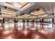Spacious ballroom with hardwood floors, ample lighting, and large windows with views of the outdoors at 3755 E Hazeltine Way, Chandler, AZ 85249