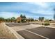 Neighborhood entrance featuring desert landscaping and gated access at 3755 E Hazeltine Way, Chandler, AZ 85249