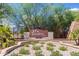 Welcoming entrance to Solera Chandler, showcasing landscaped grounds and a secure gated entry at 3755 E Hazeltine Way, Chandler, AZ 85249