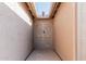 Stylish entryway featuring a custom metal security gate with desert-themed designs at 3755 E Hazeltine Way, Chandler, AZ 85249