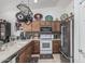 Well-equipped kitchen with stainless steel appliances and stylish tile backsplash, perfect for cooking at 3755 E Hazeltine Way, Chandler, AZ 85249