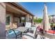 Charming patio space with comfortable seating, ideal for enjoying the outdoors in style at 3755 E Hazeltine Way, Chandler, AZ 85249