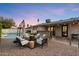 Inviting backyard with pool, fire pit, lounge chairs, and outdoor dining area offering a relaxing retreat at 4613 S Rita Ln, Tempe, AZ 85282