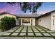 Charming entrance with stone and artificial grass flooring at 4613 S Rita Ln, Tempe, AZ 85282