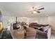 Open-concept living room and kitchen featuring wood floors and an open layout at 4613 S Rita Ln, Tempe, AZ 85282