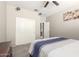 Bedroom with carpet floors, ceiling fan, and sliding closet doors at 5312 S 33Rd Ave, Phoenix, AZ 85041