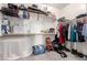 Walk-in closet with shelves, hanging racks, and carpet floors at 5312 S 33Rd Ave, Phoenix, AZ 85041