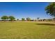 Picturesque park with green fields and various trees on a sunny day at 5312 S 33Rd Ave, Phoenix, AZ 85041