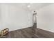This modern bedroom features wood-look floors and a ceiling fan to keep you cool at 554 N Sunset Dr, Chandler, AZ 85225