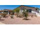 Well-maintained front yard featuring desert landscaping and charming curb appeal on a sunny day at 554 N Sunset Dr, Chandler, AZ 85225