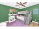 Charming bedroom with bunk beds, playful decor, and soft, comforting colors at 5612 E Emile Zola Ave, Scottsdale, AZ 85254