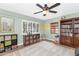Light and airy bedroom featuring soft green walls, natural light, and playful décor at 5612 E Emile Zola Ave, Scottsdale, AZ 85254