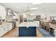 Bright, modern kitchen features a large island, stainless steel appliances, and a light, airy design at 5612 E Emile Zola Ave, Scottsdale, AZ 85254