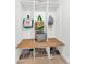 Mudroom featuring built-in cubbies with a bench, shoe storage, and shelving for organization at 5612 E Emile Zola Ave, Scottsdale, AZ 85254