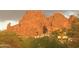 Scenic view of Camelback Mountain with lush desert landscaping and the soft glow of sunset lighting at 5625 N 45Th St, Phoenix, AZ 85018