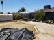 Backyard featuring a patio, block planter boxes, and a storage shed at 6011 N 33Rd Ave, Phoenix, AZ 85017