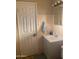 Bathroom includes a vanity with storage, a sink, and a mirror with lighting at 6011 N 33Rd Ave, Phoenix, AZ 85017